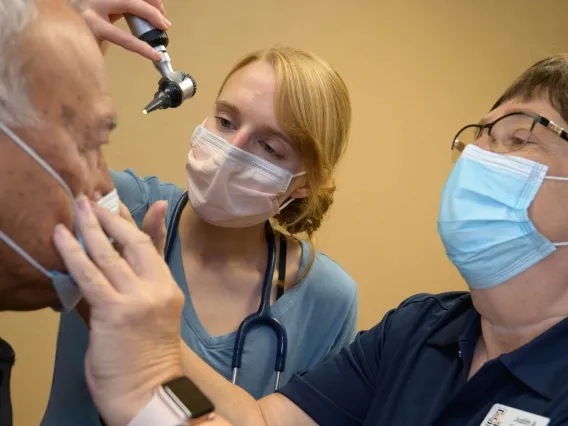 doctors examining a patient
