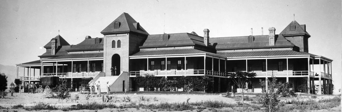 Black and white photo of the Old Main building from the 1890s