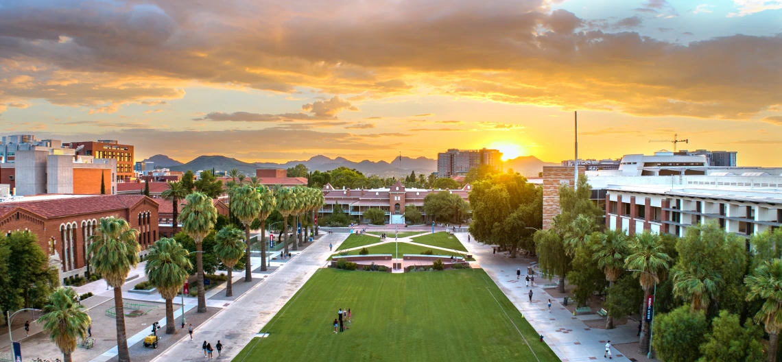 Overhead drone image of the U of A mall with a sunset background