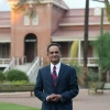 Suresh Garimella stands in front of Old Main